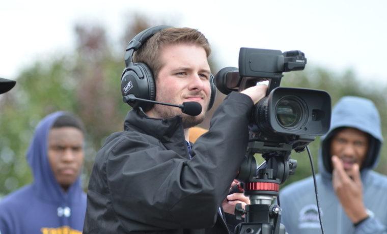 broadcast student on football field